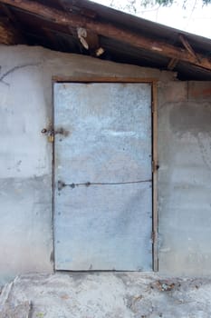 Old house door of poor people in thailand