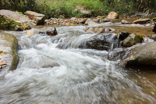 Nice small waterfall on mountain brook