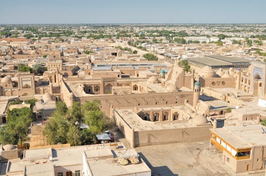 Aerial view of old town in Khiva, Uzbekistan with large palace