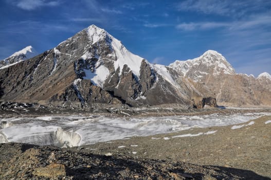 Scenic Engilchek glacier with picturesque Tian Shan mountain range in Kyrgyzstan