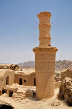 Ruins of old houses in village of Kharanaq in Iran