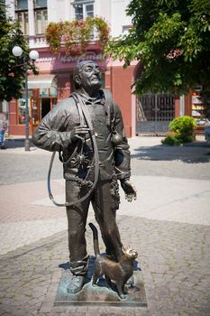 Monument of Happy Chimney Sweeper with cat. The monument with real chimney sweeper Bertalon Tovt as prototype was unveiled on June 12, 2010 by Ukrainian sculptor Ivan Brovdi