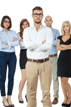 Successful business team of diverse young executives standing cheering and celebrating their success with an attractive young businesswoman or team leader in the foreground, on white