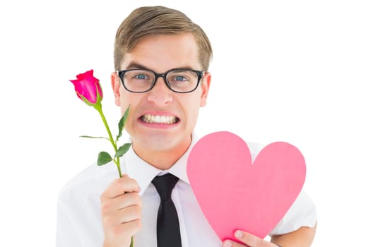 Geeky hipster holding a red rose and heart card on white background