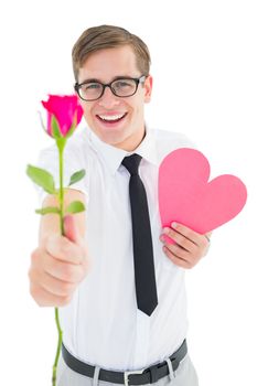 Geeky hipster holding a red rose and heart card on white background