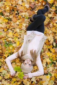 attractive young woman relaxing in atumn park outdoor nature yellow
