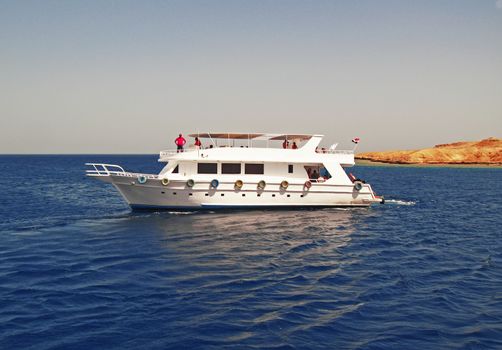 White Ship Moving By The Red Sea