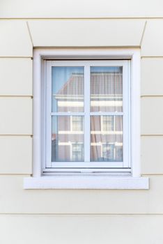 White color vintage style window with cream color wall