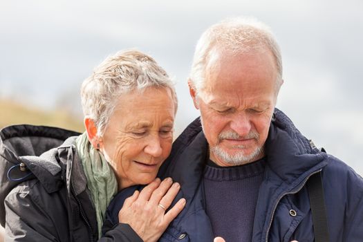 happy elderly senior couple walking on beach healthcare recreation