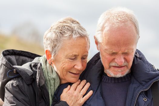 happy elderly senior couple walking on beach healthcare recreation