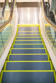 an escalator almost end to the floor