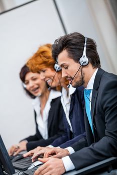 friendly callcenter agent operator with headset telephone support service 