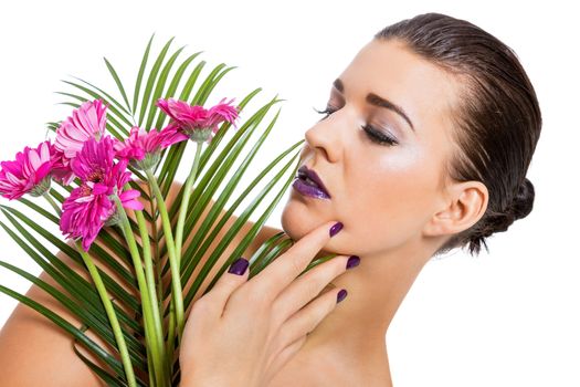 Beautiful woman in purple make-up portrait isolated