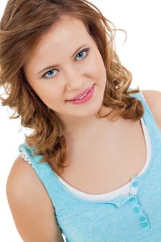 Natural portrait of a pretty young woman with long tousled hair and a sincere gentle expression, head and shoulders isolated on white