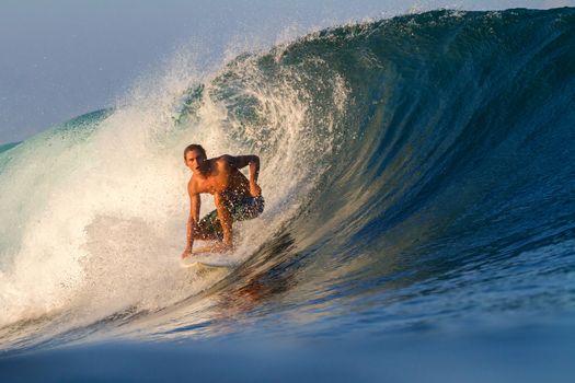 Picture of Surfing a Wave.Sumbawa Island. Indonesia.