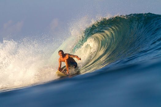 Picture of Surfing a Wave.Sumbawa Island. Indonesia.
