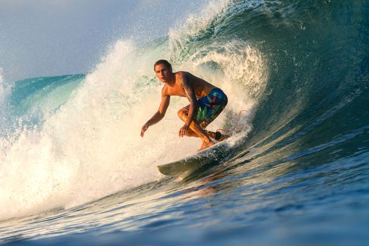 Picture of Surfing a Wave.Sumbawa Island. Indonesia.