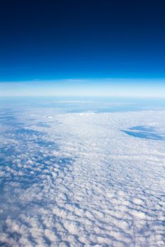 blue sky above overcast cloud air view background only