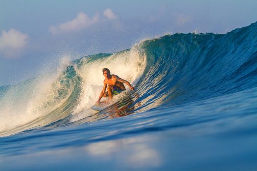 Picture of Surfing a Wave.Sumbawa Island. Indonesia.