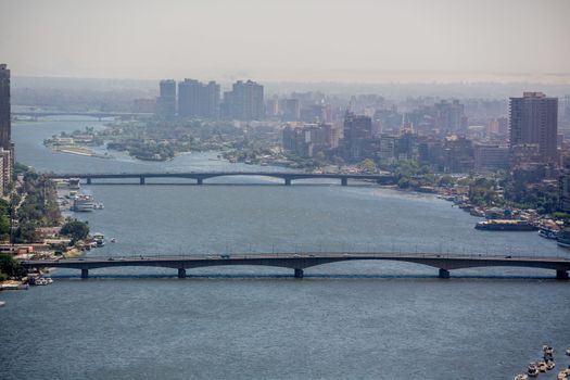 Aerial view of the downtown area of Cairo along the Nile River as viewed from the top of Cairo Tower. Cairo, Egypt – April 26, 2014.