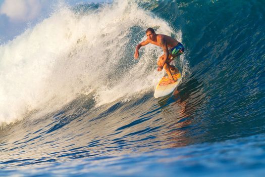 Picture of Surfing a Wave.Sumbawa Island. Indonesia.