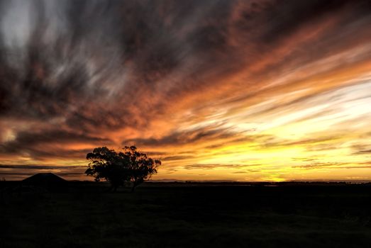 Breathtaking view of red and yellow sunset over Cabo Polonio                 