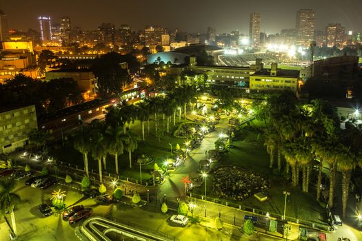 Aerial view of the city of Cairo with densely packed residential homes and buildings