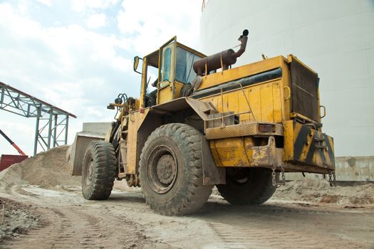 Bulldozer on sand. heavy construction loader bulldozer at construction area