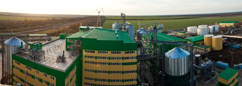 Towers of grain drying enterprise. metal grain facility with silos
