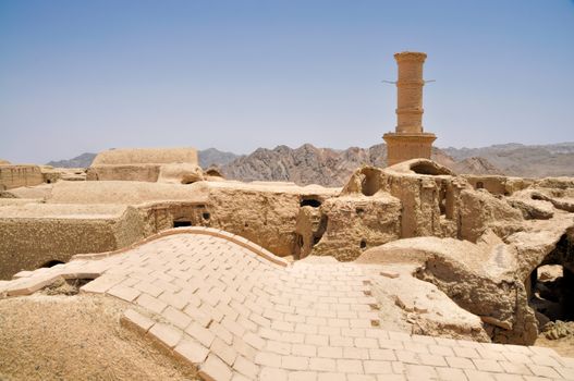 Ruins of old houses in village of Kharanaq in Iran