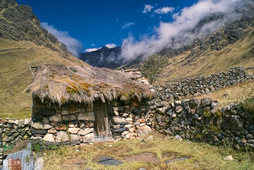Traditional old stone hut in Andes mountains in Bolivia on Choro trek