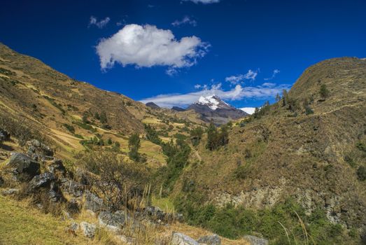 Picturesque green canyon in between hills of Peruvian Andes
