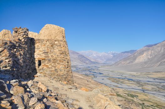 Scenic ancient ruins on the ridge in Pamir mountains in Tajikistan