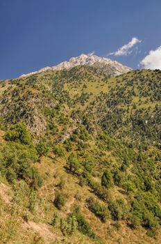 Scenic peak in mountain range Tien-Shan in Kyrgyzstan