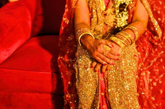 Traditional henna on brides hands on wedding in Bangladesh