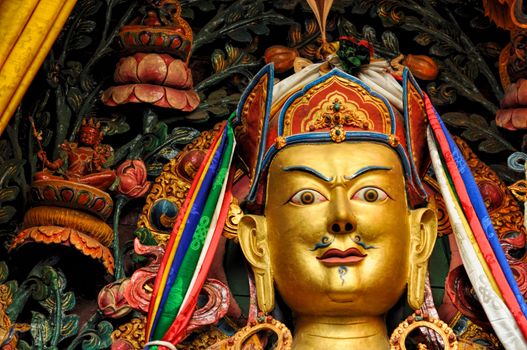 Decorated golden statue of buddhist deity in Nepal