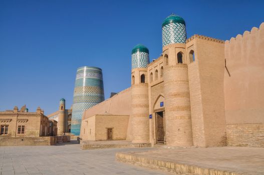 Scenic view of gate and surrounding walls in old town of Khiva, Uzbekistan