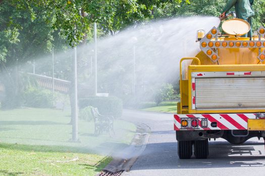 water truck watering in the garden, in thailand