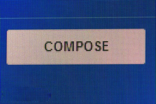 compose button. Macro screen view of old monitor
