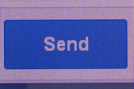 blue send button. Macro screen view of old monitor