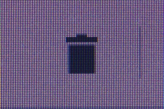 trash can button. Macro screen view of old monitor.