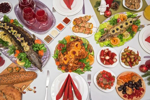 Lots of traditional festive food on table. Christmas table.