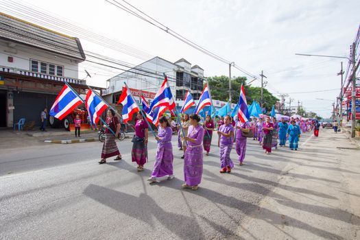 CHIANGRAI, THAILAND - AUG 12: unidentified people celebrating Thai Mother Day on August 12, 2014 in Chiangrai, Thailand. Today is a celebration of the Queen's birthday as well as to honor every mothers.