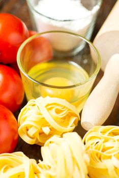 Set of ingredients for cooking healthy mediterranean dish on old wooden table