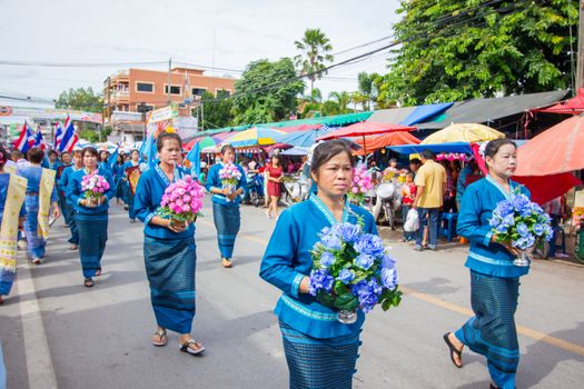CHIANGRAI, THAILAND - AUG 12: unidentified people celebrating Thai Mother Day on August 12, 2014 in Chiangrai, Thailand. Today is a celebration of the Queen's birthday as well as to honor every mothers.