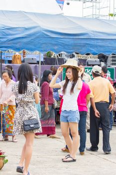 CHIANGRAI, THAILAND - AUG 12: unidentified young woman taking photograph her friend on a August 12, 2014 in Chiangrai, Thailand.