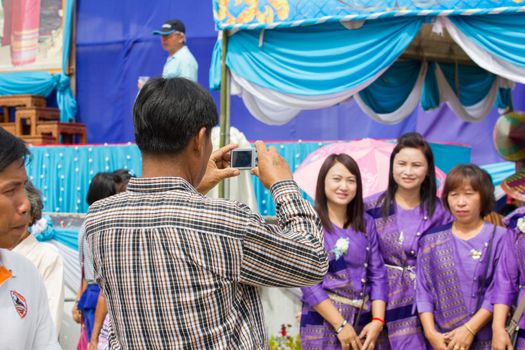 CHIANGRAI, THAILAND - AUG 12: unidentified man using camera on August 12, 2014 in Chiangrai, Thailand.