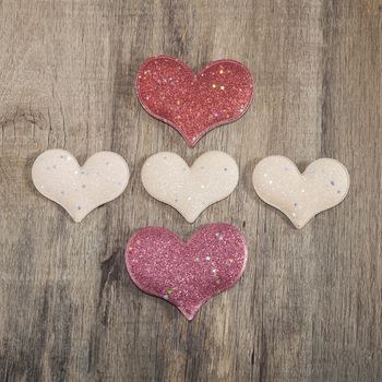 Hearts on the wooden background