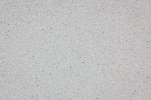extreme closeup of a grey cardboard texture, background.
