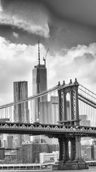 Manhattan Bridge with Downtown Manhattan skyline.